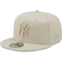 graue-snapback-kappe-mit-flachem-schirm-und-grauem-logo-9fifty-league-essential-der-new-york-yankees-mlb-von-new-era