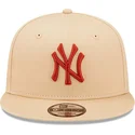 beige-snapback-9fifty-league-essential-kappe-der-new-york-yankees-mlb-von-new-era