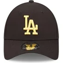 schwarze-verstellbare-kappe-mit-gebogenem-schirm-und-gelbem-logo-9forty-league-essential-der-los-angeles-dodgers-mlb-von-new-era