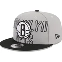 graue-und-schwarze-flache-snapback-kappe-9fifty-draft-edition-2023-von-brooklyn-nets-nba-von-new-era