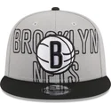 grau-schwarze-snapback-cap-9fifty-draft-edition-2023-der-brooklyn-nets-nba-von-new-era