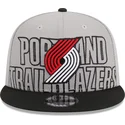 graue-und-schwarze-flache-snapback-kappe-9fifty-draft-edition-2023-von-portland-trail-blazers-nba-von-new-era
