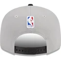graue-und-schwarze-flache-snapback-kappe-9fifty-draft-edition-2023-von-portland-trail-blazers-nba-von-new-era