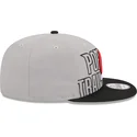 graue-und-schwarze-flache-snapback-kappe-9fifty-draft-edition-2023-von-portland-trail-blazers-nba-von-new-era