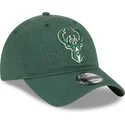 grune-verstellbare-curved-cap-9twenty-draft-edition-2023-der-milwaukee-bucks-nba-von-new-era