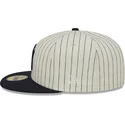 beige-und-marineblaues-59fifty-retro-script-fitted-cap-der-new-york-yankees-mlb-von-new-era