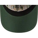 gra-och-gron-justerbar-kurvskarmkeps-9twenty-tip-off-2023-milwaukee-bucks-nba-fran-new-era
