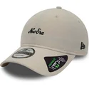 beige-justerbar-bojd-keps-9twenty-repreve-heritage-script-fran-new-era