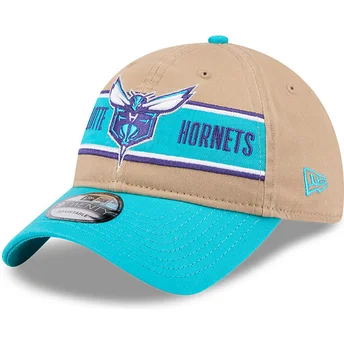 Justerbar 9TWENTY Draft 2024 brun och blå böjd keps Charlotte Hornets NBA från New Era