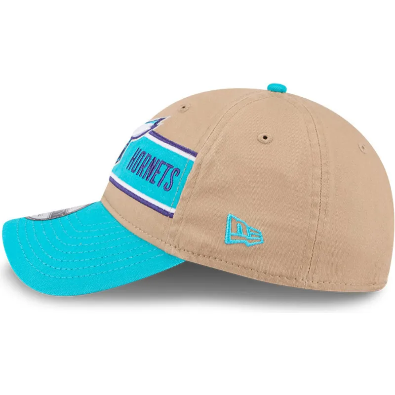 braune-und-blaue-verstellbare-curved-cap-9twenty-draft-2024-der-charlotte-hornets-nba-von-new-era