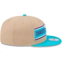 braune-und-blaue-flatcap-snapback-9fifty-draft-2024-der-charlotte-hornets-nba-von-new-era