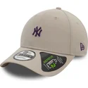 new-era-curved-brim-purple-logo-9forty-repreve-mini-logo-new-york-yankees-mlb-beige-adjustable-cap