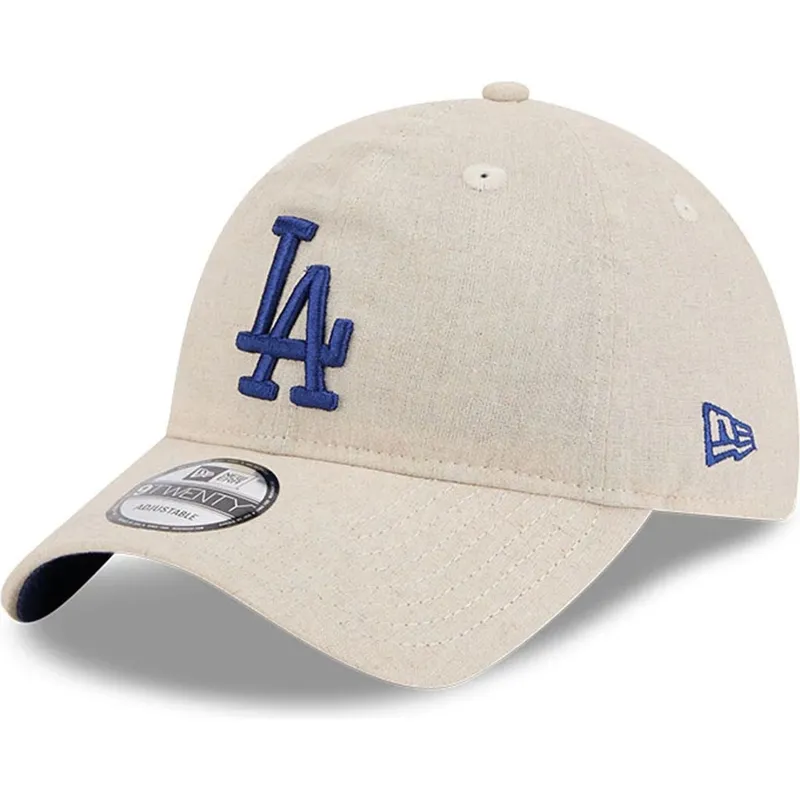 beige-verstellbare-curved-cap-mit-blauem-logo-9twenty-linen-spring-training-fan-pack-2025-der-los-angeles-dodgers-mlb-von-new-er