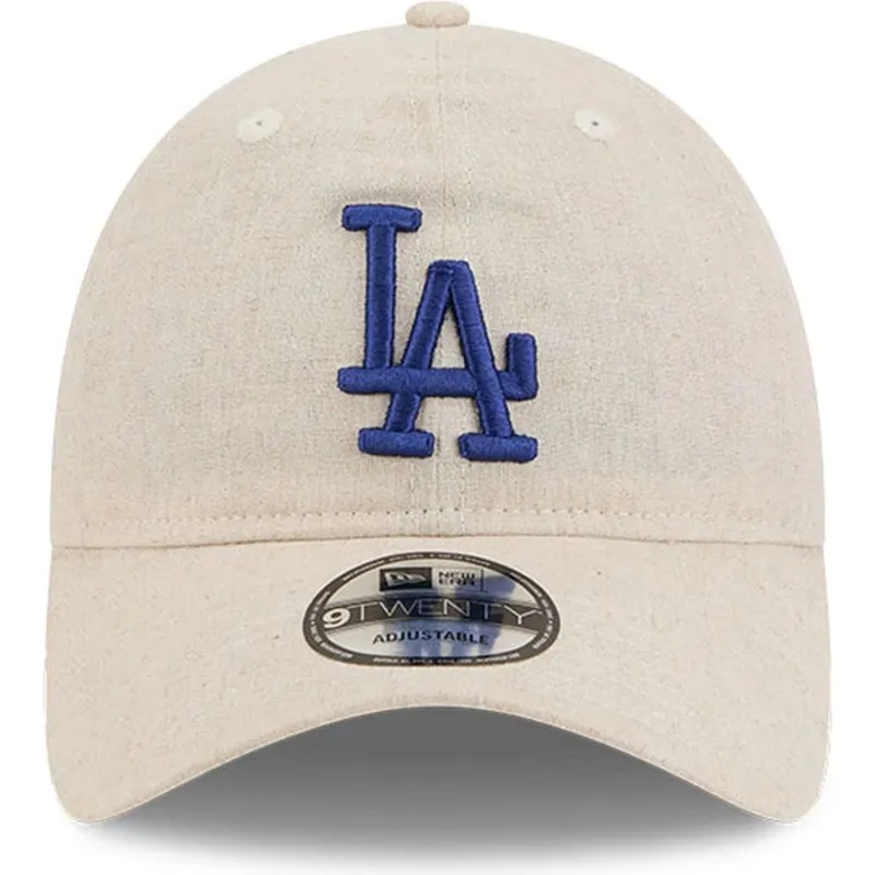 beige-verstellbare-curved-cap-mit-blauem-logo-9twenty-linen-spring-training-fan-pack-2025-der-los-angeles-dodgers-mlb-von-new-er