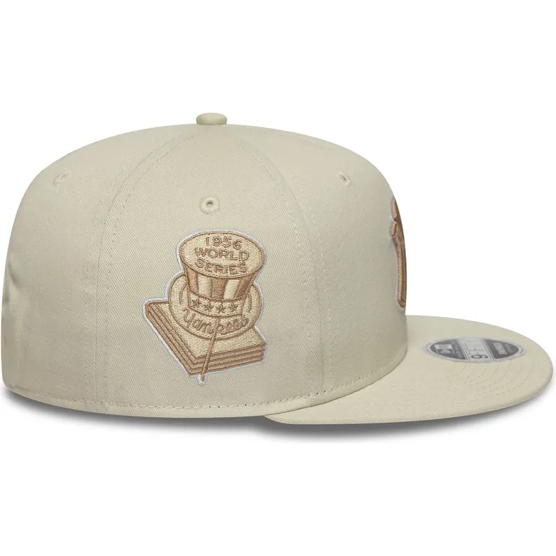 beige-flatcap-snapback-mit-beigem-logo-9fifty-original-fit-world-series-der-new-york-yankees-mlb-von-new-era