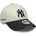beige-und-marineblau-verstellbare-9forty-side-script-kappe-der-new-york-yankees-mlb-von-new-era