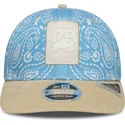 blaue-und-beige-gebogene-snapback-kappe-9seventy-stretch-snap-lifestyle-von-racing-bulls-f1-team-formula-1-von-new-era
