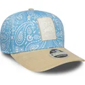 blaue-und-beige-gebogene-snapback-kappe-9seventy-stretch-snap-lifestyle-von-racing-bulls-f1-team-formula-1-von-new-era