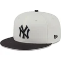beige-und-schwarze-59fifty-clr-dvlp-fitted-cap-der-new-york-yankees-mlb-von-new-era