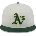 beige-und-grune-anliegende-flat-cap-59fifty-clr-dvlp-der-oakland-athletics-mlb-von-new-era