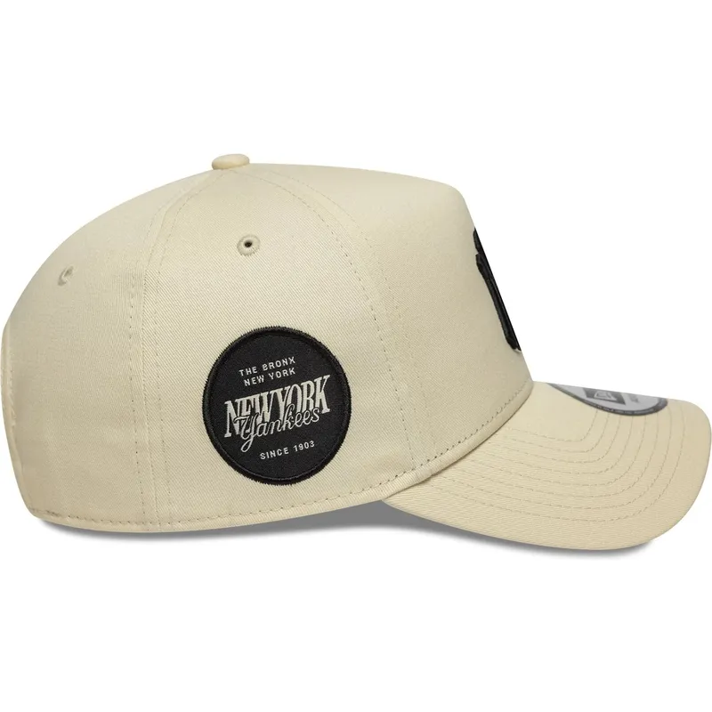 sapkak-ivelt-bezs-snapback-9forty-e-frame-side-patch-new-york-yankees-mlb-new-era sapkak-ivelt-bezs-snapback-9forty-e-frame-side-patch-new-york-yankees-mlb-new-era