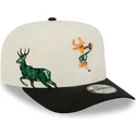 beige-und-schwarze-snapback-9fifty-a-frame-precurved-hardwood-classics-kappe-der-milwaukee-bucks-nba-von-new-era