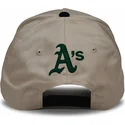 beige-och-svart-bojd-keps-snapback-rise-structured-fran-oakland-athletics-mlb-av-nike