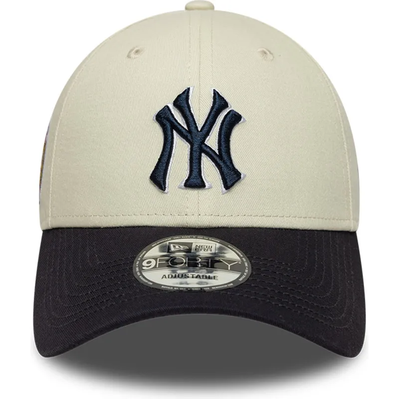 beige-und-marineblaue-verstellbare-curved-cap-mit-marineblauen-logo-9forty-world-series-der-new-york-yankees-mlb-von-new-era