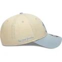 bojd-keps-beige-och-bla-snapback-med-bla-logotyp-9forty-m-crown-side-script-fran-new-york-yankees-mlb-av-new-era